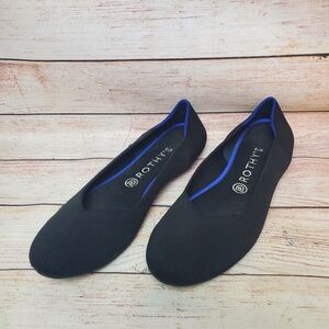 Rothy's Elegant Black Flats with Blue Trim